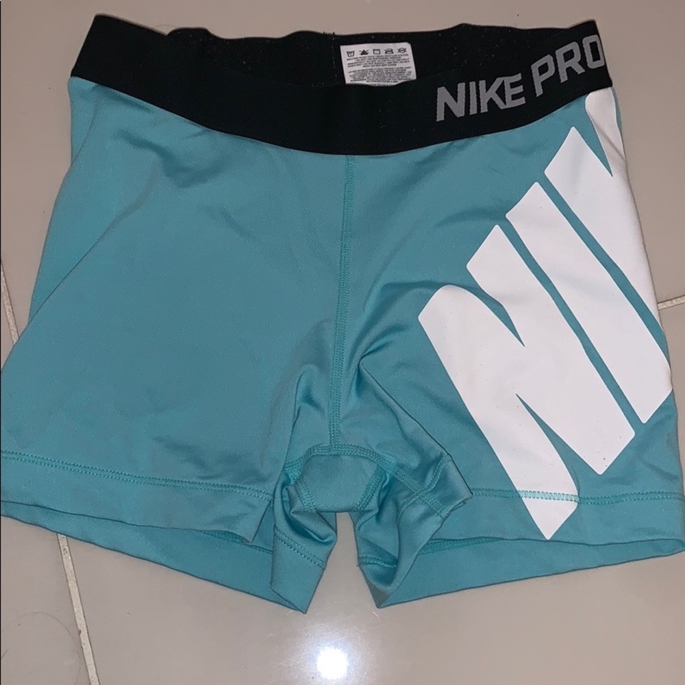 Total of 4 pairs Teal,peach, pink, and green